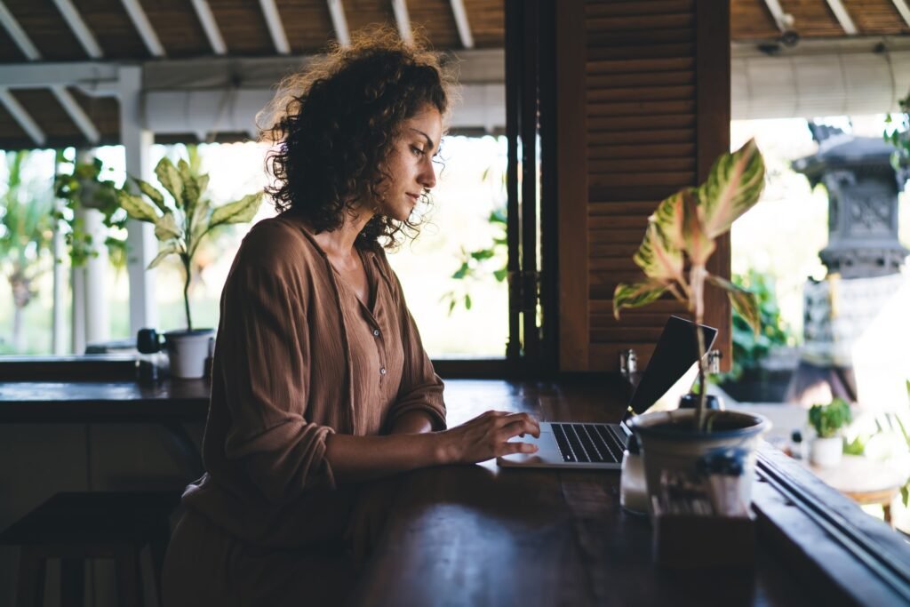 Caucaisan digital nomad creating text and graphic design