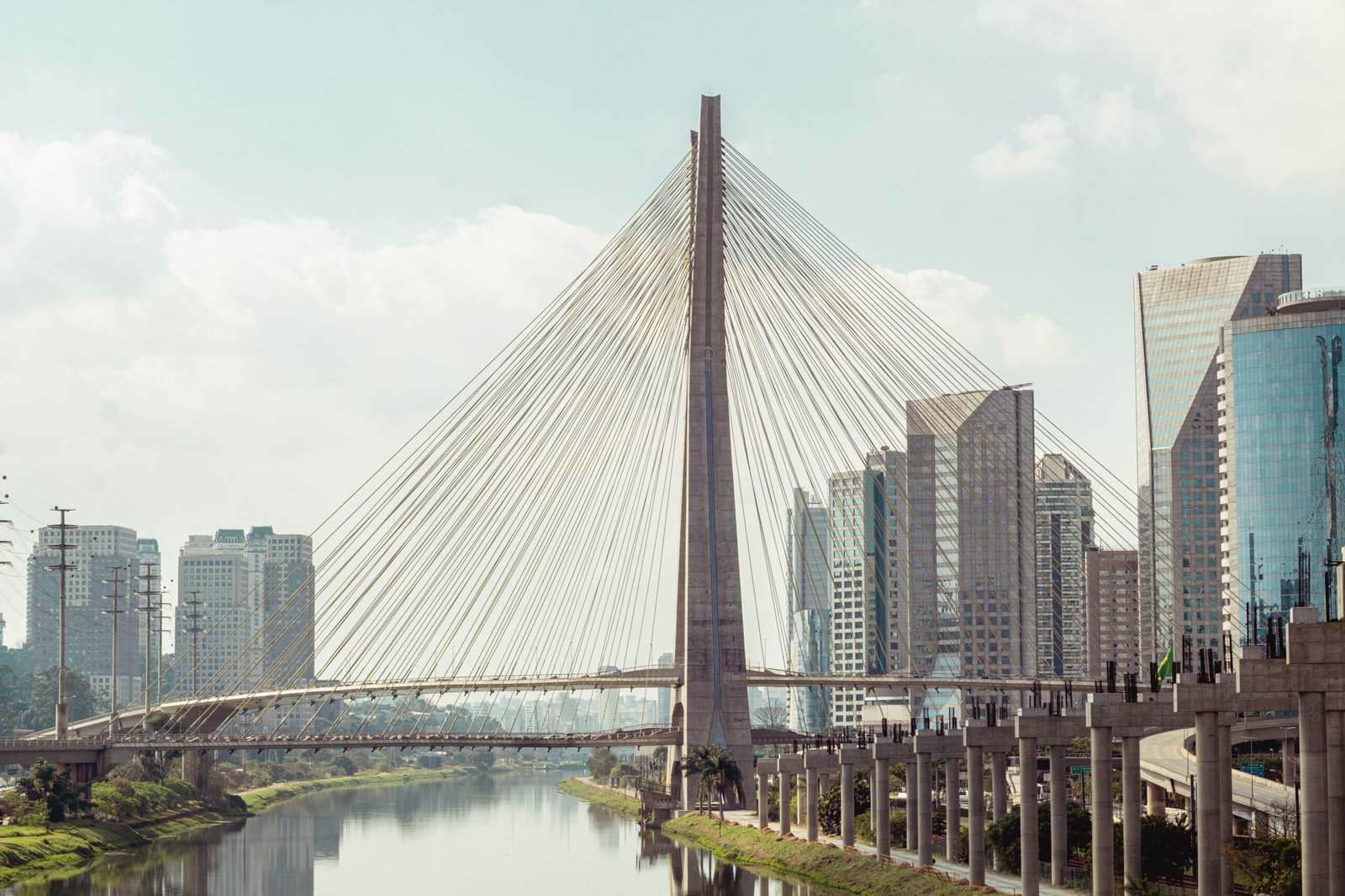 gray concrete bridge over river