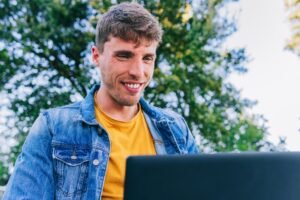 Close up of a digital nomad working outdoors