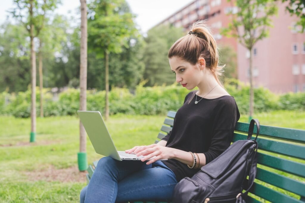 Young woman using computer remote working