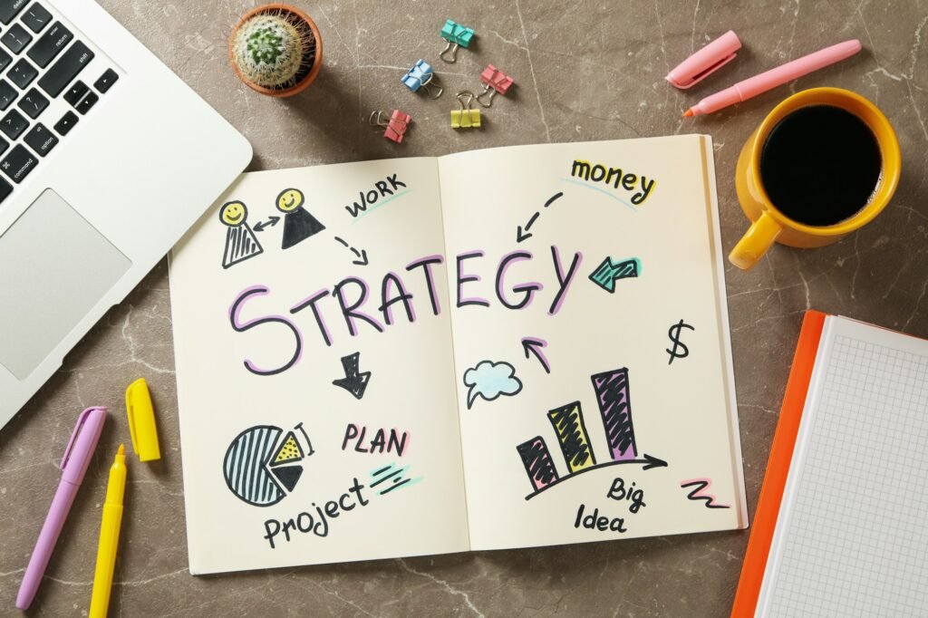 Concept of business strategy on gray table, top view